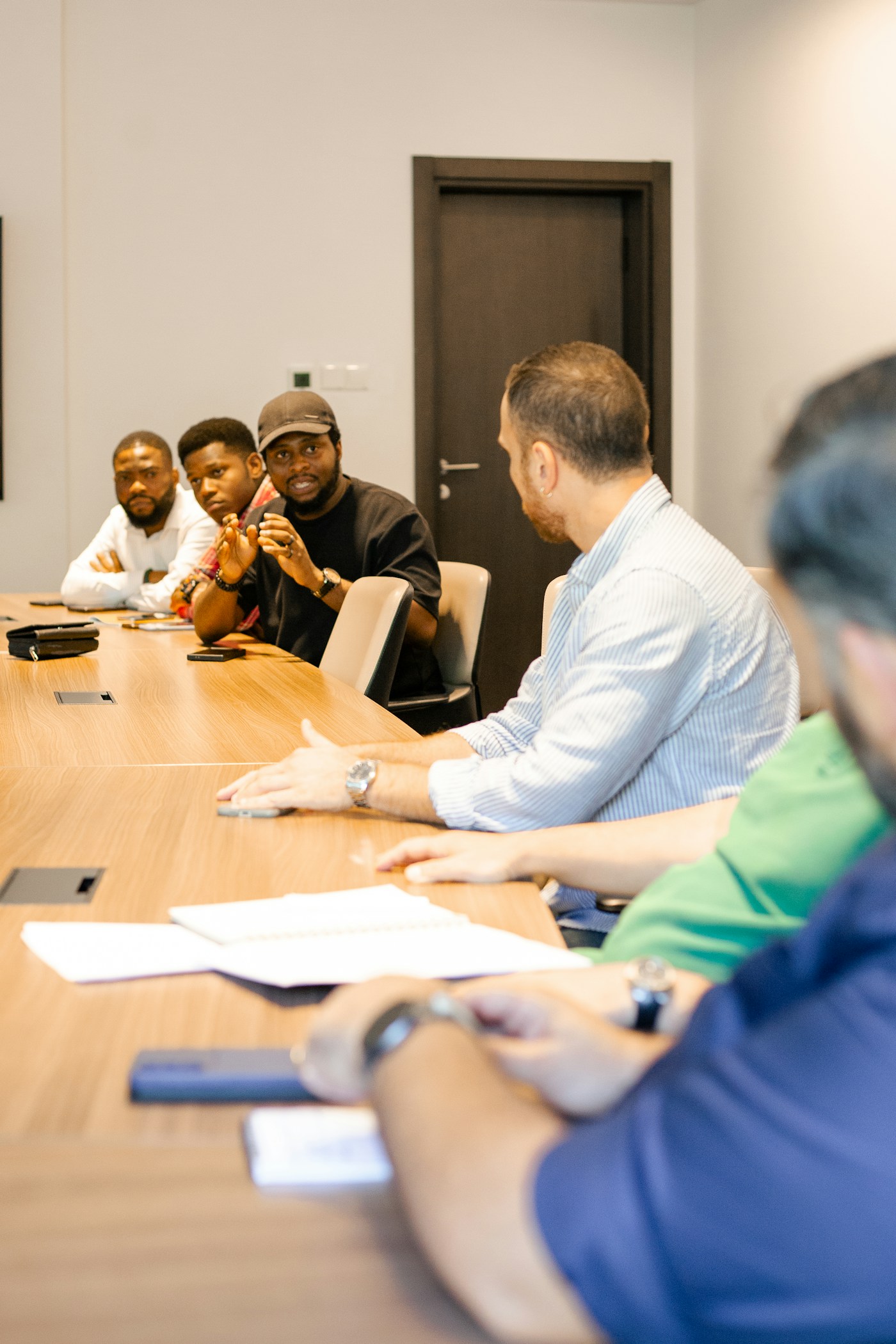 Diverse team collaborating around a table