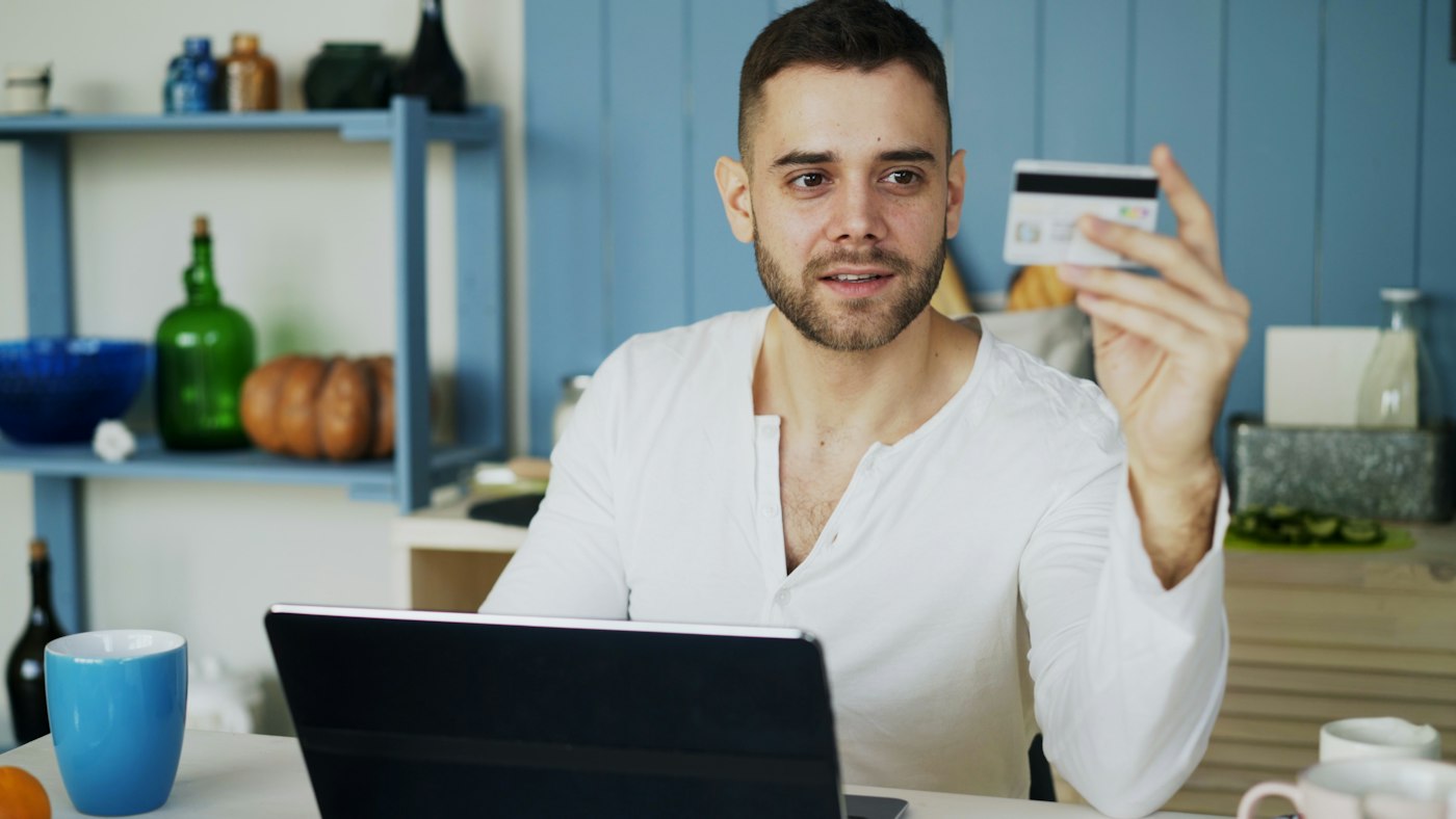 Online shopping and payment process on a laptop
