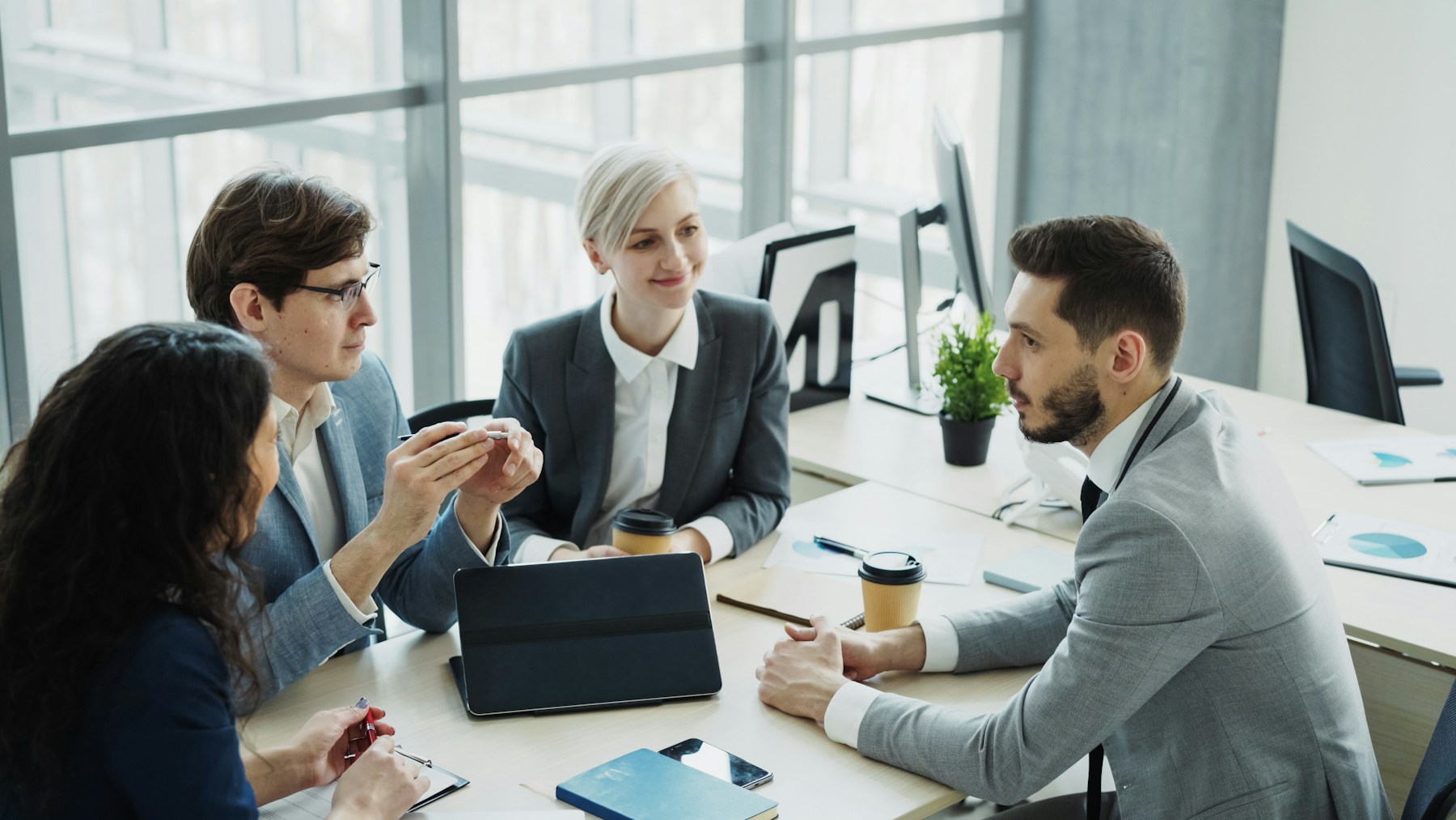 Diverse business team collaborating around a table